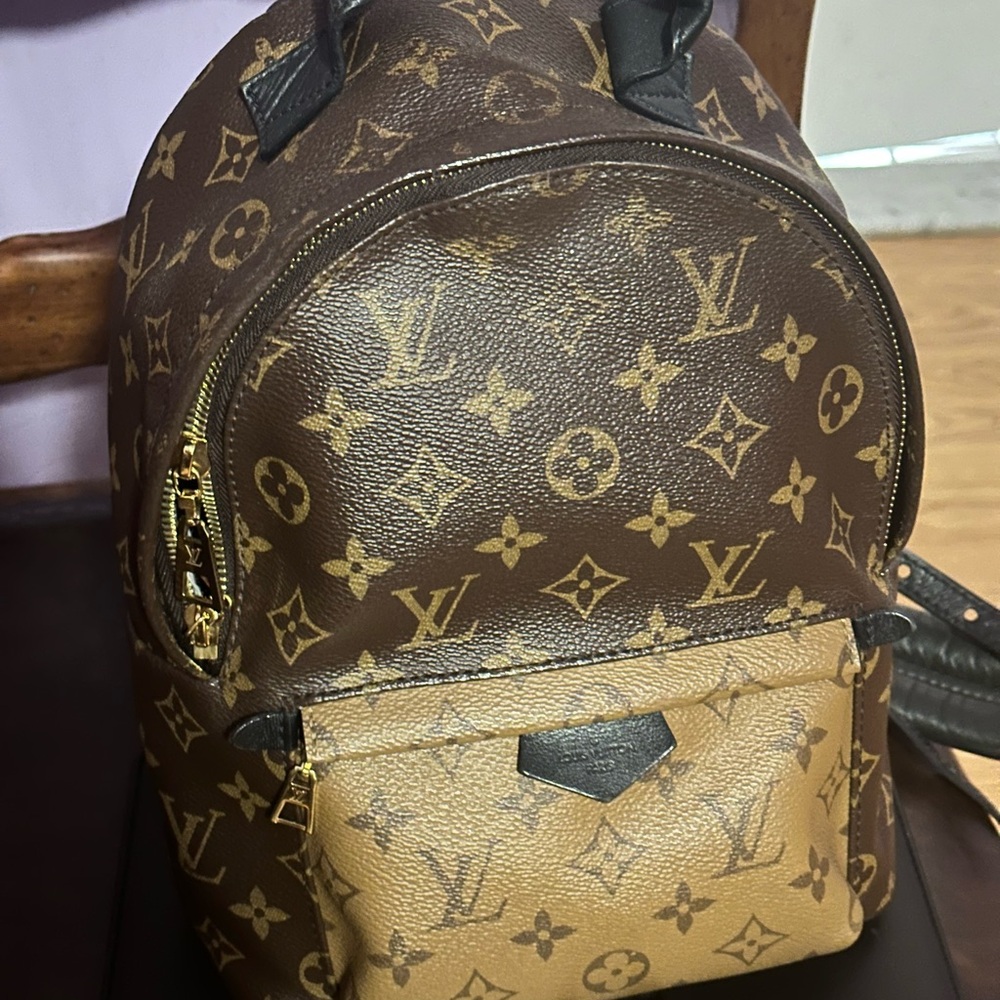 Pre- Love LOUIS VUITTON PALM BACKPACK REVERSE MONOGRAM CANVAS.